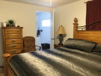 This home recently underwent a total rehab.  New vinyl plank on Spanish Lakes I in Florida - for sale on GolfHomes.com, golf home, golf lot