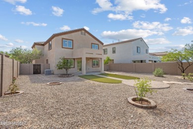 Located in Rancho Vistoso, this Elevation C Plan with Stone sits on The Golf Club at Vistoso in Arizona - for sale on GolfHomes.com, golf home, golf lot