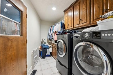 Beautifully remodeled full brick home nestled in a cul-de-sac on on Indian Springs Country Club in Oklahoma - for sale on GolfHomes.com, golf home, golf lot