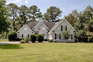 Seize the rare opportunity to own an architectural designed home on Wedgefield Plantation Golf Club in South Carolina - for sale on GolfHomes.com, golf home, golf lot