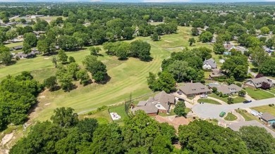 Beautifully remodeled full brick home nestled in a cul-de-sac on on Indian Springs Country Club in Oklahoma - for sale on GolfHomes.com, golf home, golf lot