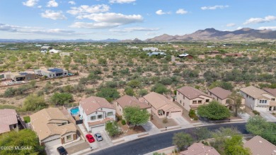 Located in Rancho Vistoso, this Elevation C Plan with Stone sits on The Golf Club at Vistoso in Arizona - for sale on GolfHomes.com, golf home, golf lot