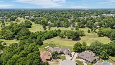 Beautifully remodeled full brick home nestled in a cul-de-sac on on Indian Springs Country Club in Oklahoma - for sale on GolfHomes.com, golf home, golf lot