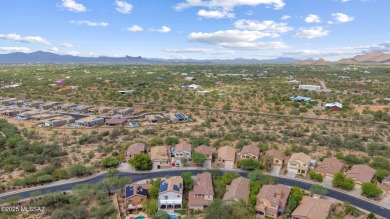 Located in Rancho Vistoso, this Elevation C Plan with Stone sits on The Golf Club at Vistoso in Arizona - for sale on GolfHomes.com, golf home, golf lot