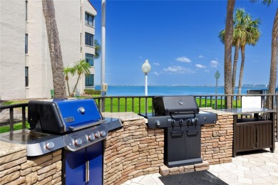 GORGEOUS & nestled on the golf greens with peaceful views, this on Isla Del Sol Yacht and Country Club in Florida - for sale on GolfHomes.com, golf home, golf lot
