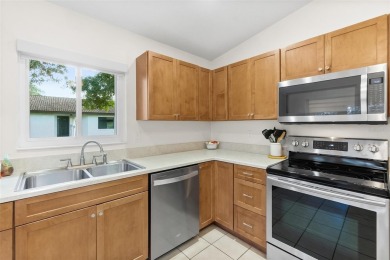 This 3 bedroom, 2 bath, GOLF course, fully furnished home is a on The Grand Club - Pine Lakes Course in Florida - for sale on GolfHomes.com, golf home, golf lot
