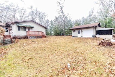 Spacious 3-Bedroom Home with Bonus Spaces and Ample Storage Near on Northern Bay Golf Resort and Marina in Wisconsin - for sale on GolfHomes.com, golf home, golf lot