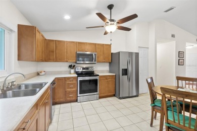 This 3 bedroom, 2 bath, GOLF course, fully furnished home is a on The Grand Club - Pine Lakes Course in Florida - for sale on GolfHomes.com, golf home, golf lot