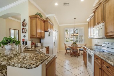 A true 3 bedroom, nearly 1700 sf, pool home overlooking a lake on Gateway Golf and Country Club in Florida - for sale on GolfHomes.com, golf home, golf lot