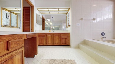 RARE AND DESIRABLE END UNIT ON AN OVERSIZED AND BEAUTIFULLY on East Lake Woodlands Country Club in Florida - for sale on GolfHomes.com, golf home, golf lot