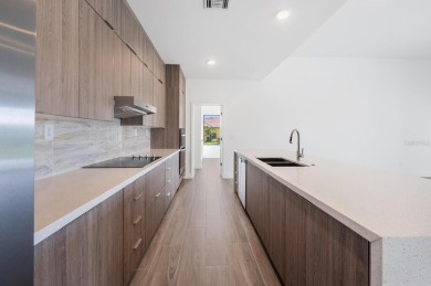 You will be proud to come home to this brand new ONX built home on Burnt Store Golf Club in Florida - for sale on GolfHomes.com, golf home, golf lot