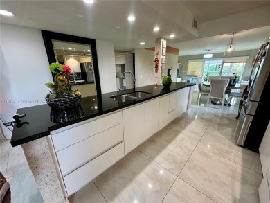 Completely remodeled 55+ condo, 2/2 Open concept 1,533 square on Flamingo Lakes Country Club in Florida - for sale on GolfHomes.com, golf home, golf lot