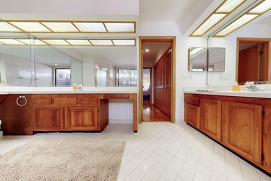 RARE AND DESIRABLE END UNIT ON AN OVERSIZED AND BEAUTIFULLY on East Lake Woodlands Country Club in Florida - for sale on GolfHomes.com, golf home, golf lot