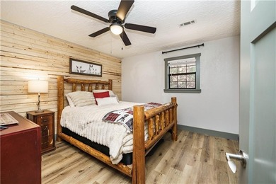 BREATHTAKING VIEWS of the lake and mountains year round!  This on Holiday Island Executive Golf Course in Arkansas - for sale on GolfHomes.com, golf home, golf lot