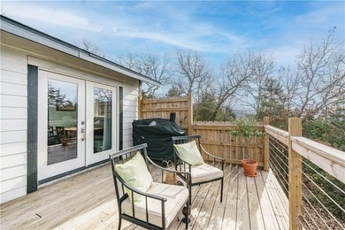 BREATHTAKING VIEWS of the lake and mountains year round!  This on Holiday Island Executive Golf Course in Arkansas - for sale on GolfHomes.com, golf home, golf lot