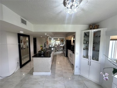 Completely remodeled 55+ condo, 2/2 Open concept 1,533 square on Flamingo Lakes Country Club in Florida - for sale on GolfHomes.com, golf home, golf lot