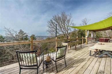 BREATHTAKING VIEWS of the lake and mountains year round!  This on Holiday Island Executive Golf Course in Arkansas - for sale on GolfHomes.com, golf home, golf lot