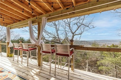 BREATHTAKING VIEWS of the lake and mountains year round!  This on Holiday Island Executive Golf Course in Arkansas - for sale on GolfHomes.com, golf home, golf lot