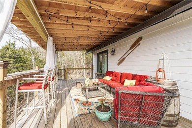 BREATHTAKING VIEWS of the lake and mountains year round!  This on Holiday Island Executive Golf Course in Arkansas - for sale on GolfHomes.com, golf home, golf lot