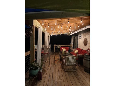 BREATHTAKING VIEWS of the lake and mountains year round!  This on Holiday Island Executive Golf Course in Arkansas - for sale on GolfHomes.com, golf home, golf lot