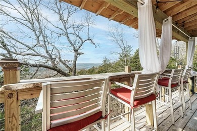 BREATHTAKING VIEWS of the lake and mountains year round!  This on Holiday Island Executive Golf Course in Arkansas - for sale on GolfHomes.com, golf home, golf lot