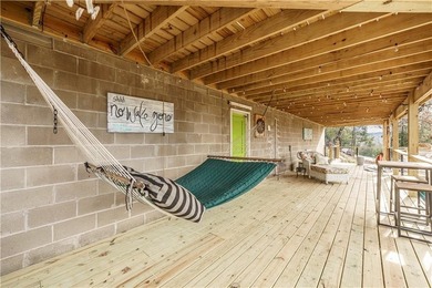 BREATHTAKING VIEWS of the lake and mountains year round!  This on Holiday Island Executive Golf Course in Arkansas - for sale on GolfHomes.com, golf home, golf lot