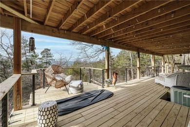 BREATHTAKING VIEWS of the lake and mountains year round!  This on Holiday Island Executive Golf Course in Arkansas - for sale on GolfHomes.com, golf home, golf lot