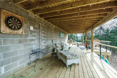 BREATHTAKING VIEWS of the lake and mountains year round!  This on Holiday Island Executive Golf Course in Arkansas - for sale on GolfHomes.com, golf home, golf lot