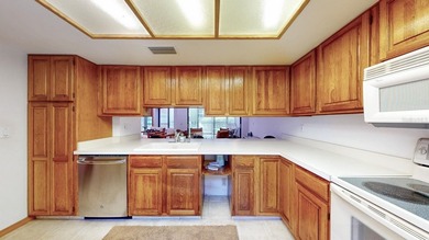 RARE AND DESIRABLE END UNIT ON AN OVERSIZED AND BEAUTIFULLY on East Lake Woodlands Country Club in Florida - for sale on GolfHomes.com, golf home, golf lot