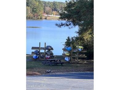 WELCOME to Lake Royale a charming, secluded community, within on River Golf and Country Club at Lake Royale in North Carolina - for sale on GolfHomes.com, golf home, golf lot