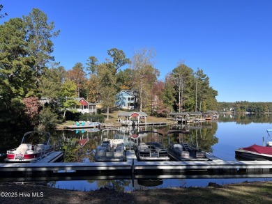 WELCOME to Lake Royale a charming, secluded community, within on River Golf and County Club at Lake Royale in North Carolina - for sale on GolfHomes.com, golf home, golf lot