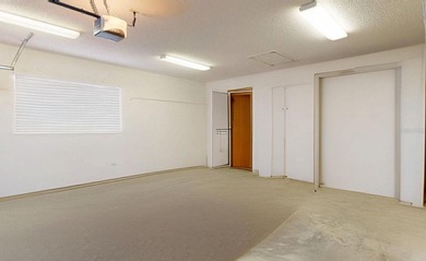 RARE AND DESIRABLE END UNIT ON AN OVERSIZED AND BEAUTIFULLY on East Lake Woodlands Country Club in Florida - for sale on GolfHomes.com, golf home, golf lot