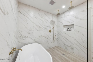 Exquisitely reimagined, this three bedroom, three and a half on Bear Creek Golf Course and Club in South Carolina - for sale on GolfHomes.com, golf home, golf lot