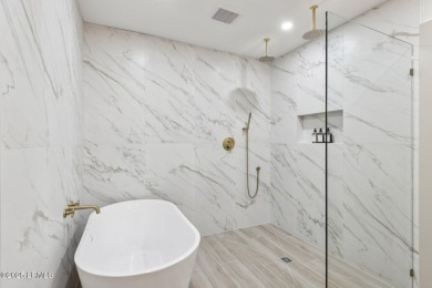 Exquisitely reimagined, this three bedroom, three and a half on Bear Creek Golf Course and Club in South Carolina - for sale on GolfHomes.com, golf home, golf lot