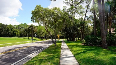 RARE AND DESIRABLE END UNIT ON AN OVERSIZED AND BEAUTIFULLY on East Lake Woodlands Country Club in Florida - for sale on GolfHomes.com, golf home, golf lot