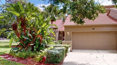 RARE AND DESIRABLE END UNIT ON AN OVERSIZED AND BEAUTIFULLY on East Lake Woodlands Country Club in Florida - for sale on GolfHomes.com, golf home, golf lot