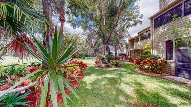 RARE AND DESIRABLE END UNIT ON AN OVERSIZED AND BEAUTIFULLY on East Lake Woodlands Country Club in Florida - for sale on GolfHomes.com, golf home, golf lot