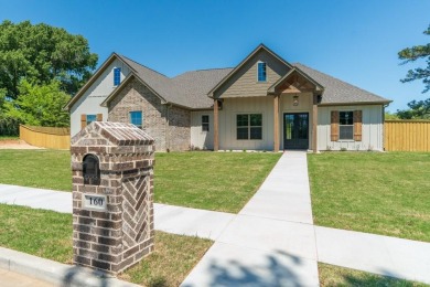 Exquisite 2443 sqft custom home with 4 beds, 2.5 baths, & 2-car on Eagles Bluff Golf Course in Texas - for sale on GolfHomes.com, golf home, golf lot