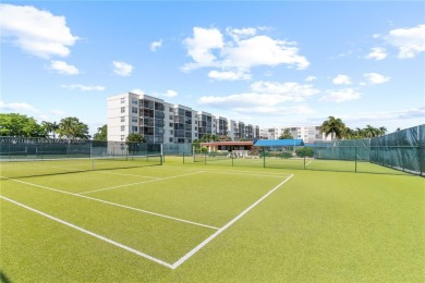 LUXURIOUS ISLAND STYLE 2BR/2BA with 17th hole PGA course green & on Hollybrook Golf and Tennis Club  in Florida - for sale on GolfHomes.com, golf home, golf lot