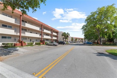 LUXURIOUS ISLAND STYLE 2BR/2BA with 17th hole PGA course green & on Hollybrook Golf and Tennis Club  in Florida - for sale on GolfHomes.com, golf home, golf lot