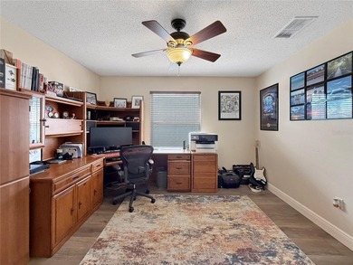 Welcome to this beautiful two-story home nestled inside the on Oaks National Golf Course in Florida - for sale on GolfHomes.com, golf home, golf lot