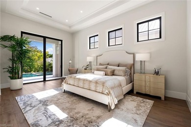 Contemporary coastal architecture with clean, modern lines is on The Moorings Country Club in Florida - for sale on GolfHomes.com, golf home, golf lot