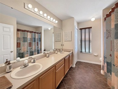 Welcome to this beautiful two-story home nestled inside the on Oaks National Golf Course in Florida - for sale on GolfHomes.com, golf home, golf lot