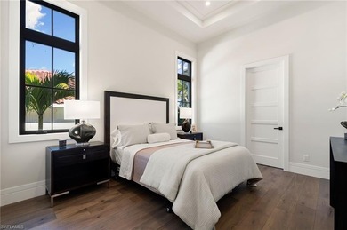 Contemporary coastal architecture with clean, modern lines is on The Moorings Country Club in Florida - for sale on GolfHomes.com, golf home, golf lot