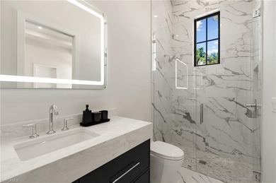 Contemporary coastal architecture with clean, modern lines is on The Moorings Country Club in Florida - for sale on GolfHomes.com, golf home, golf lot