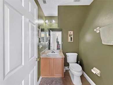 Welcome to this beautiful two-story home nestled inside the on Oaks National Golf Course in Florida - for sale on GolfHomes.com, golf home, golf lot