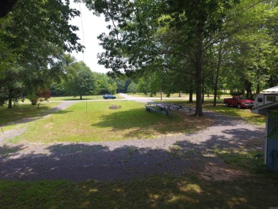Beautiful level lot in a great riverfront neighborhood with on Lost Creek Golf Club in Arkansas - for sale on GolfHomes.com, golf home, golf lot