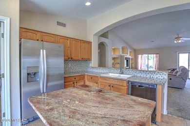 This well maintained home features an inviting atmosphere on Saddlebrooke Golf Course in Arizona - for sale on GolfHomes.com, golf home, golf lot