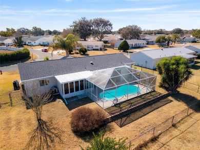 Pool Home for Sale in Spruce Creek South that comes Fully on The Links of Spruce Creek in Florida - for sale on GolfHomes.com, golf home, golf lot