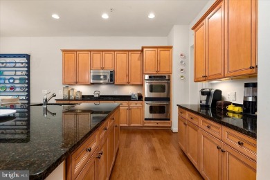 This gorgeous luxury townhome in the sought-after community of on The Peninsula Golf and Country Club in Delaware - for sale on GolfHomes.com, golf home, golf lot